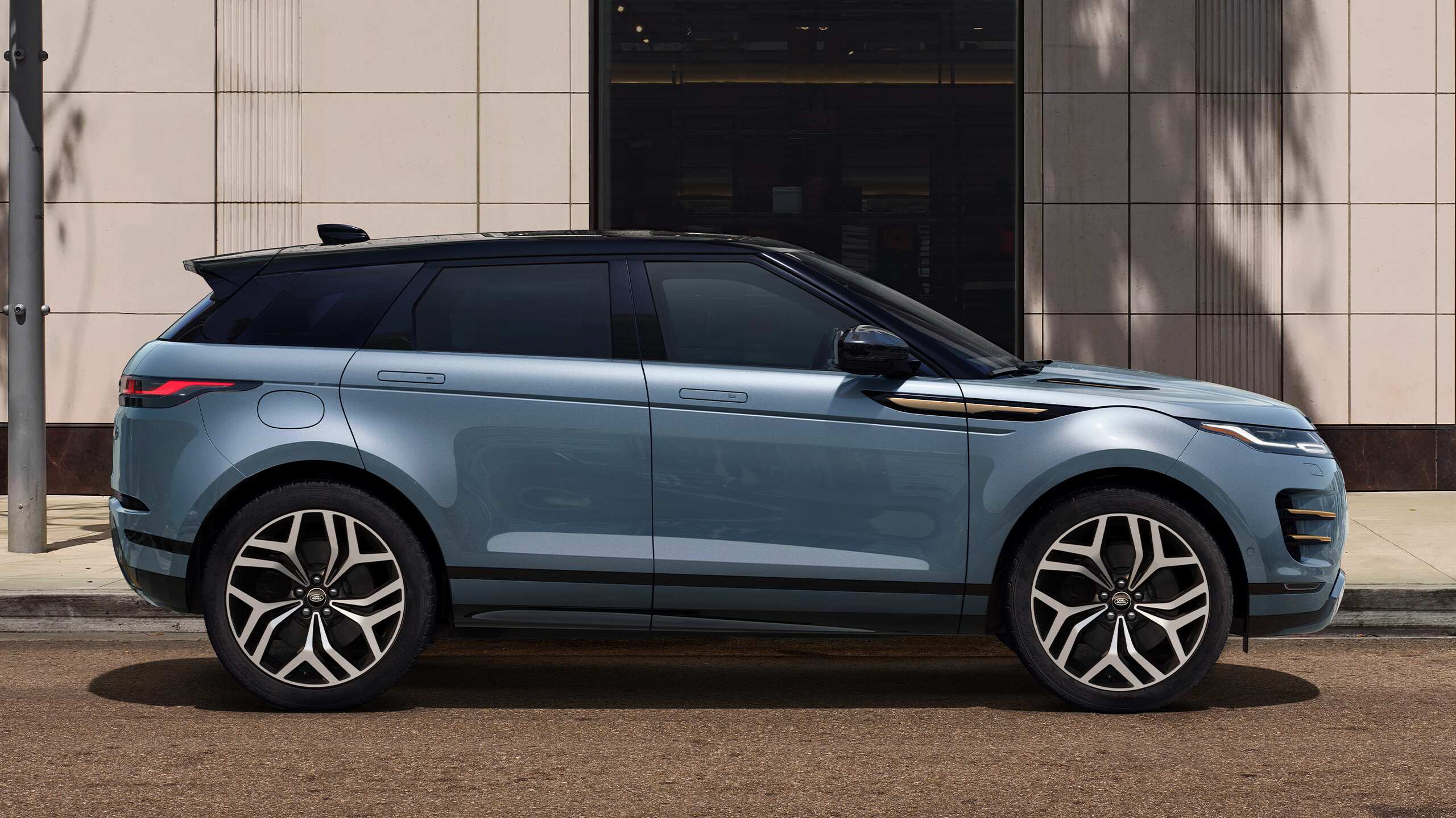 Evoque Parked In Front Of Building